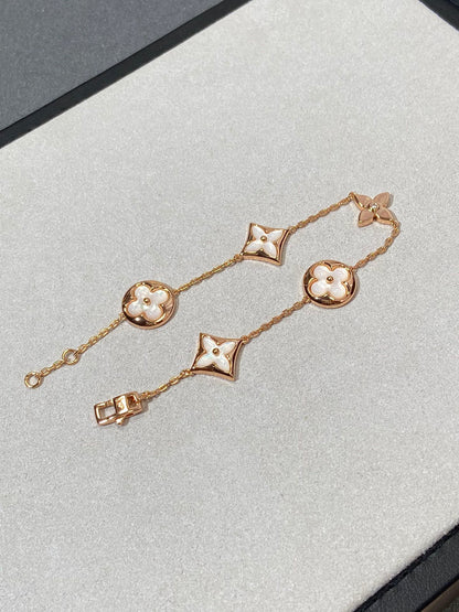 [AuraEcho]STAR AND SUN 5 MOTIF MOP PINK GOLD BRACELET